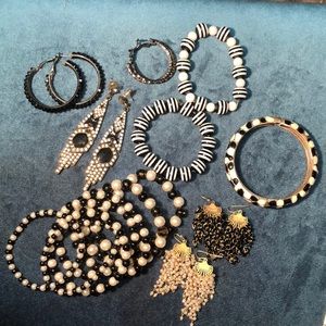 Lot of black and white jewelry. Assorted earrings and bracelets.